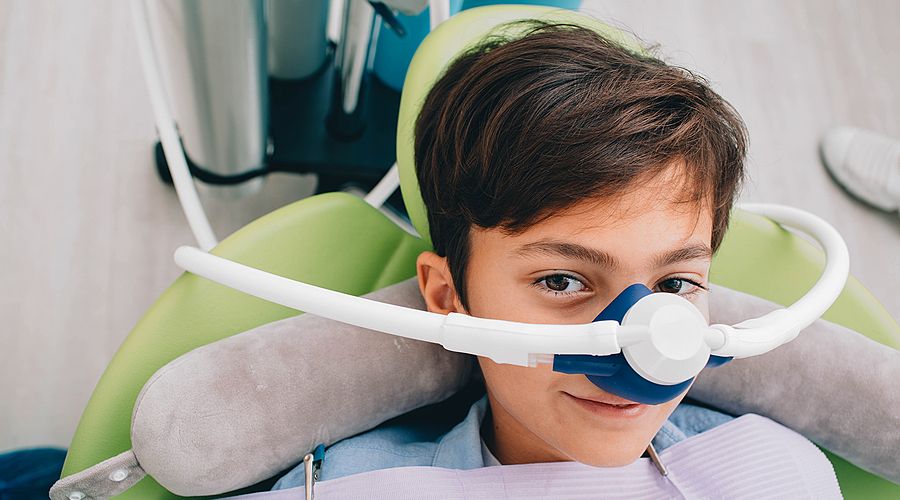 Photo of a child receiving nitrous oxide.