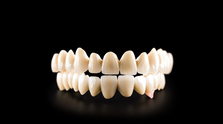 A photo of a porcelain dental bridge.